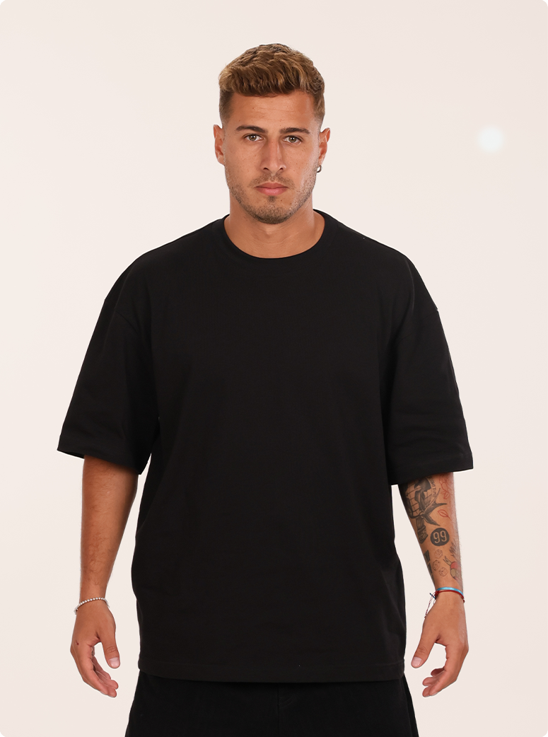 Damien wear a 8.1 oz Max Heavyweight Oversized Tee