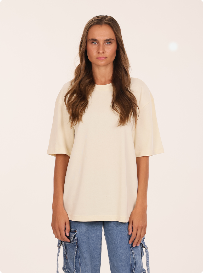 Madeline wear a 8.1 oz Max Heavyweight Oversized Tee